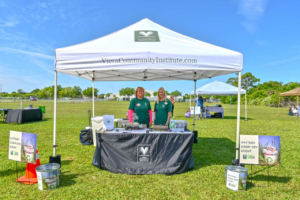 VCI Table_Battery Recycle_Lois LeBlanc and Laurie Widzgowski_Viera Nature Festival 2022